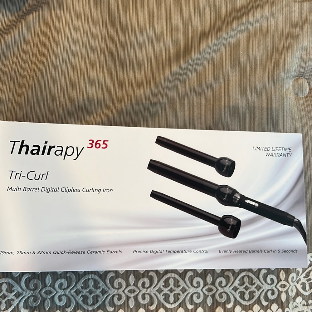 Thairapy 365 Tri-curl multi barrel digital clip less curling iron. Brand new